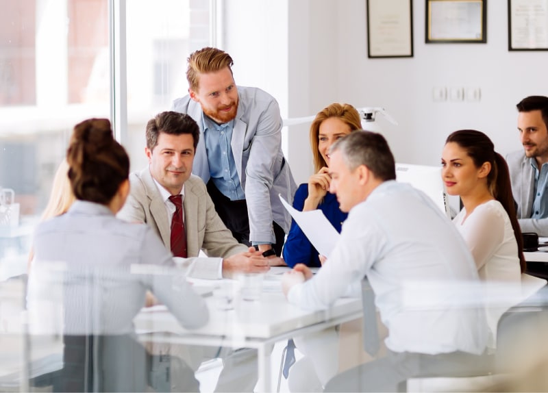 Group of people in conference room meeting